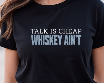 May include: Black t-shirt with the text "TALK IS CHEAP WHISKEY AIN'T" in white lettering.