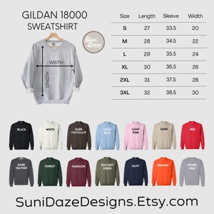 May include: A light gray Gildan 18000 sweatshirt displayed with a size chart and color options. The chart shows measurements for sizes S to 3XL, including length, sleeve, and width in inches. Available colors include black, white, and red.