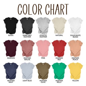 May include: Color chart showing different t-shirt colors, including black, dark grey heather, athletic heather, natural, solid white blend, maroon, heather mauve, pink, heather red, heather peach, heather navy, light blue, heather olive, heather kelly, and yellow.