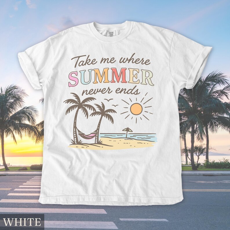 May include: White t-shirt with a beach scene graphic. The design includes palm trees, a hammock, a sun, and the text "Take me where SUMMER never ends." The shirt is a casual wear item.