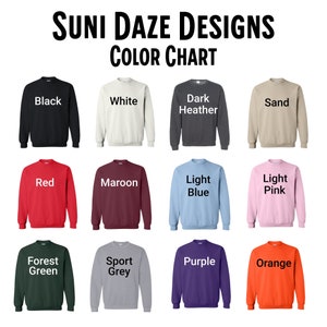 Op de afbeelding: Kleurenkaart met 12 verschillende kleuren sweatshirts. De kleuren zijn: Zwart, Wit, Donkergrijs melange, Zand, Rood, Bordeauxrood, Lichtblauw, Lichtroze, Bosgroen, Sportgrijs, Paars en Oranje.