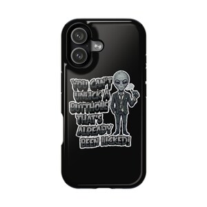 May include: A black smartphone case featuring a graphic of a grey alien wearing a dark suit and tie, holding a smoking pipe. The text reads: YOU CAN'T UNLICK A BUTTHOLE THAT'S ALREADY BEEN LICKED! The design is centered on the back of the phone case.
