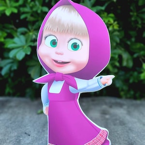 May include: A cartoon character cutout of a girl with blonde hair wearing a pink dress and a red hooded cloak. She is smiling and pointing to the right.