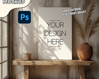 May include: A canvas mockup with the text "YOUR DESIGN HERE" displayed on a white canvas. The canvas is on a wooden bench with a vase of dried plants. The image includes the text "VIDEO TUTORIAL PSD SMART OBJECT" and a Photoshop logo.