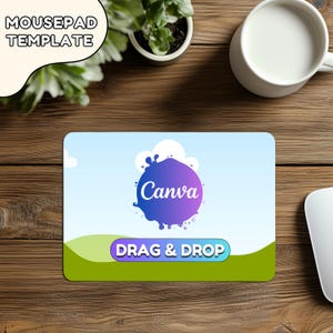 May include: A blue and purple splatter design with the word "Canva" in white text. The design is on a green and blue mousepad with the text "DRAG & DROP" in white text on a blue button.