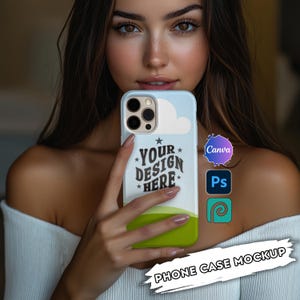 May include: A white phone case with a blue sky and white cloud design. The case has a green grass design at the bottom and the text "YOUR DESIGN HERE" in black. The case is being held by a person's hand.