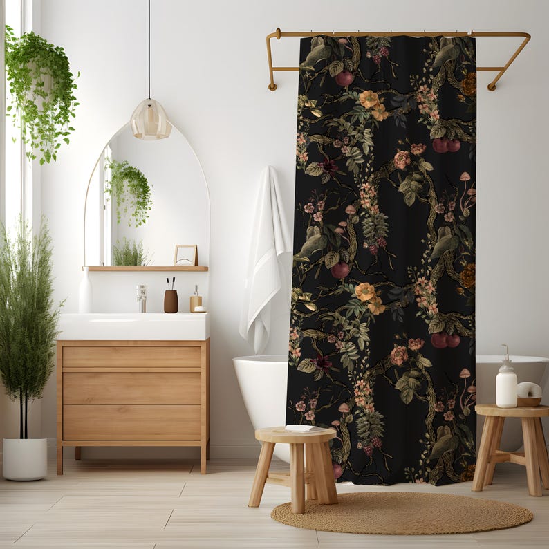 May include: A black shower curtain featuring a repeating botanical pattern of dark green leaves, winding branches, small red fruits, and muted orange and pink flowers. The fabric displays a dense, intricate design of nature-inspired elements.