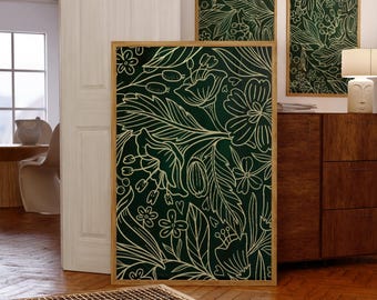 May include: A set of three framed prints featuring a green background and gold floral designs. The prints are hung on a white wall above a wooden dresser.