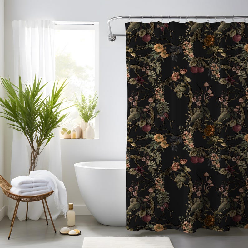 May include: A shower curtain featuring a dark black background with a repeating botanical pattern of intertwined branches, small red apples, pale pink blossoms, clusters of green leaves, and small light-colored mushrooms throughout the design.