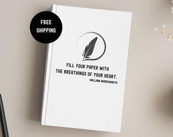 May include: A white hardback journal featuring a black graphic of a feather inside a circular line. The text reads: FILL YOUR PAPER WITH THE BREATHINGS OF YOUR HEART. -WILLIAM WORDSWORTH. A black circular badge in the corner says FREE SHIPPING.