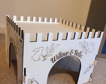 Animal Castle is suitable for Rabbits,  This Castle is personalised with your Animal's name on the Front and side.