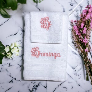 Personalized hand towel with decorative initial letter. Monogrammed towel.