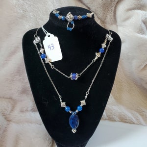 Blue lapis lazuli pendant on a 2 layer necklace with sapphire blue quartz and a bracelet to match