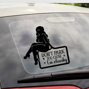 May include: Black and white silhouette of a woman sitting on a sign that says "Don't park too close I'm chunky".