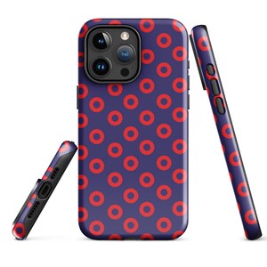 May include: A blue phone case with a red donut pattern. The case is designed for an iPhone with a camera bump.