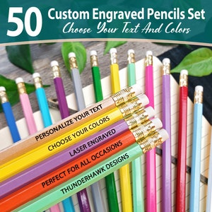May include: Set of 50 custom engraved pencils in various colors. The pencils are arranged on a notebook with the text "PERSONALIZE YOUR TEXT", "CHOOSE YOUR COLORS", "LASER ENGRAVED", "PERFECT FOR ALL OCCASIONS", and "THUNDERHAWK DESIGNS" printed on them.