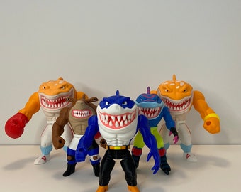 Full Color and Posable 3D Printed Street Sharks Ripster Slammu Jab Streex 90’s Cartoon Shark Toy | Designed by La Calavera 3DPrint