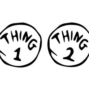 May include: Two black and white circular designs, each featuring the word "THING" above a number. One reads "THING 1" and the other "THING 2". The font is playful, and the design is reminiscent of a children's book.