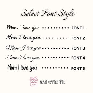 May include: An image displays five font styles for the phrase "Mom I love you." Each style is presented with a dotted line and a corresponding font number. The text "Select Font Style" is at the top, and the Heart Krafted Gifts logo is at the bottom.