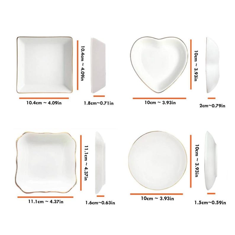 May include: Four white ceramic dishes with gold trim in various shapes: square, heart, and round. Measurements are provided in inches and centimeters. The square dishes are 4.09 inches (10.4 cm) wide. The heart and round dishes are 3.93 inches (10 cm) wide.