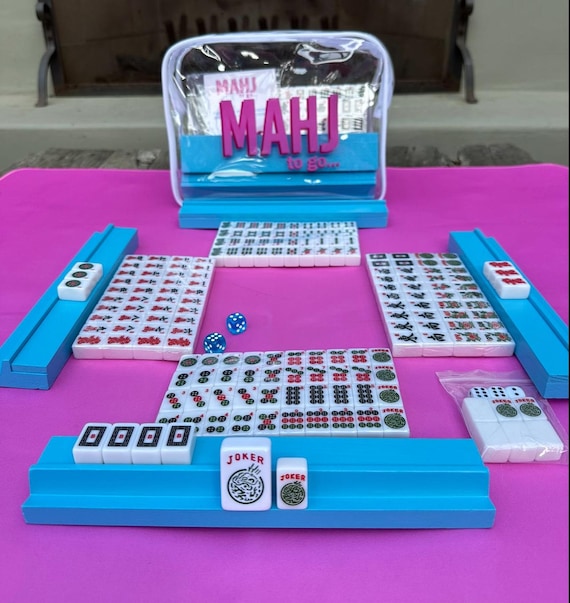 Full travel Mahjong set in CLEAR vinyl bag, 166 travel tiles 4 racks/one with magnetic pusher. All have flat surface to expose your tile