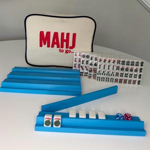 Travel Mahjong set. Canvas bag, 166 mini travel tiles and 4 racks/one with magnetic pusher. All have flat surface to expose your tiles.
