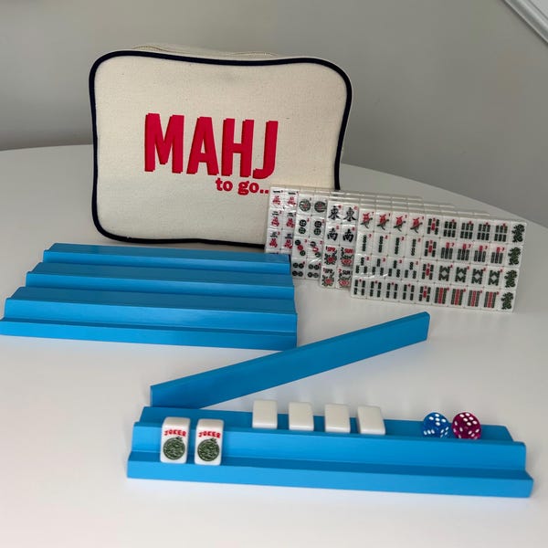 Travel Mahjong set. Canvas bag, 166 mini travel tiles and 4 racks/one with magnetic pusher. All have flat surface to expose your tiles.