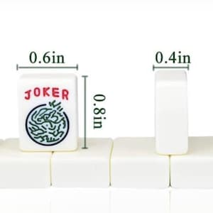 Travel Mahjong set. Canvas bag, 166 mini travel tiles and 4 racks/one with magnetic pusher. All have flat surface to expose your tiles. imagen 4