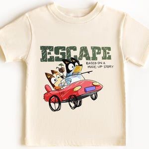 Escape Based on a Made-Up Story Shirt – Funny Blue Dog Dad Tee, Cartoon-Inspired T-Shirt, Soft & Comfortable Unisex Family Shirt