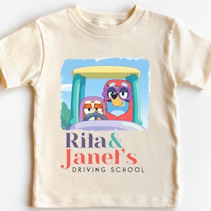 Rita Janet Driving School T-Shirt – Funny Blue Dog Grannies Tee
