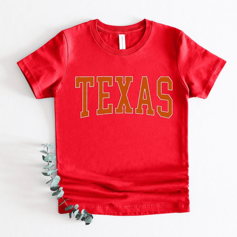 a red shirt with the word texas on it