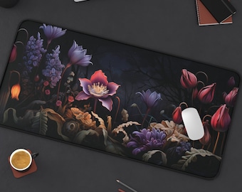 May include: A dark floral mousepad with a black background and colorful flowers in shades of pink, purple, and red. The mousepad features a stylized design of flowers and leaves.