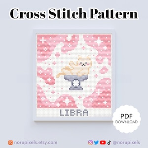 May include: A cross stitch pattern featuring a light orange cat sitting in a grey scale, set against a pink and white cloud background with stars. The text LIBRA is printed in grey at the bottom. The image includes the text Cross Stitch Pattern.
