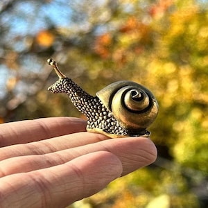 Brass snail antique