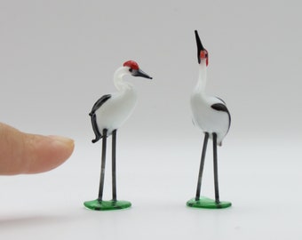 Un par de grúas de vidrio japonesas hechas a mano Heron miniatura de vidrio dos piezas