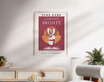 May include: A framed print of a book cover for Jane Eyre by Charlotte Brontë. The cover features a red background with a gold illustration of a woman in a white dress and a quote from the book: "I would always rather be happy than dignified."