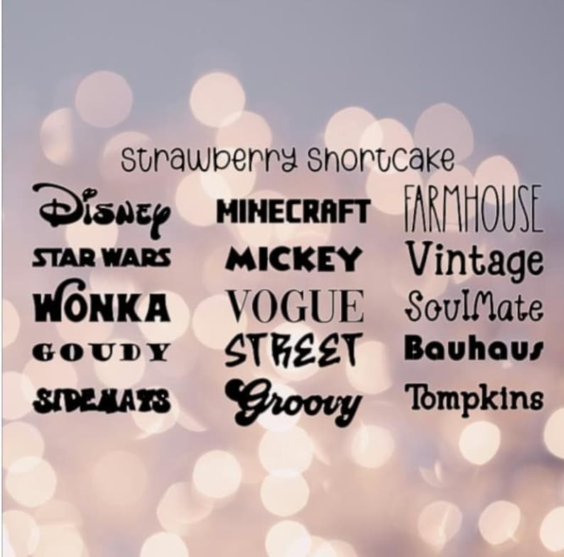 May include: A collection of black text samples arranged in three columns, featuring the words: Strawberry Shortcake, Disney, Minecraft, Farmhouse, Star Wars, Mickey, Vintage, Wonka, Vogue, SoulMate, Goudy, Street, Bauhaus, Sidemats, Groovy, and Tompkins in various fonts.