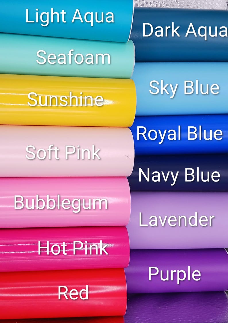 May include: A collection of vinyl rolls arranged in two columns, featuring colors labeled Light Aqua, Seafoam, Sunshine, Soft Pink, Bubblegum, Hot Pink, Red, Dark Aqua, Sky Blue, Royal Blue, Navy Blue, Lavender, and Purple.