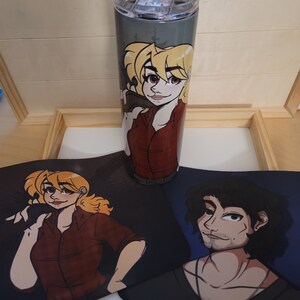 May include: Two illustrated coasters featuring cartoon characters. One coaster features a woman with blonde hair wearing a red shirt and holding a gun. The other coaster features a man with brown hair wearing a black shirt and a necklace. Both coasters have a dark background.