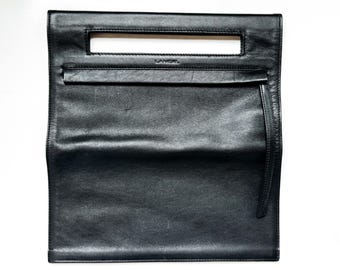 Vintage Lancel Paris Black Leather Fold-Over Clutch | Sculptural Handle Cutout