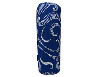 May include: Blue golf club head cover with a white wave pattern.