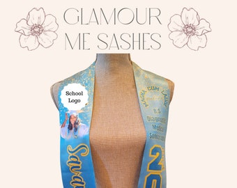 May include: A blue and gold graduation sash with the text "Savanna Walker" and "2024" on it. The sash also has a school logo and the text "Magna Cum Laude" and "B.S. Diagnostic Medical Sonography".