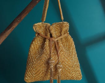 Golden Silk Bridal Potli Bag: Handcrafted Nalki Beadwork, Indian Wedding