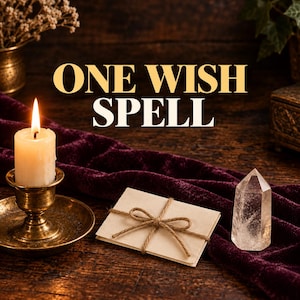 May include: A lit white candle in a brass holder, a small beige envelope tied with twine, and a clear quartz crystal point resting on a dark purple velvet cloth. The text ONE WISH SPELL is displayed in large gold and white lettering.
