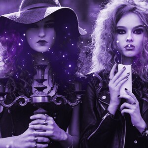 May include: A dark-haired individual wearing a wide-brimmed hat holds a metal candelabra, while another individual with curly hair holds a white pillar candle. Both are dressed in black, with purple lighting and floating light particles.