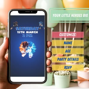 May include: A digital invitation on a smartphone screen for a birthday party featuring a blue and red cartoon character. The invitation reads "Saturday 15th March 2 PM" and "Your Little Heroes Big Day!" with customisable fields for name, age, party details, and RSVP.