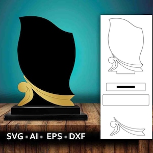 Könnte beinhalten: Eine schwarze und goldene Trophäe mit wellenförmigem Design. Die Trophäe hat einen leeren Platz zum Gravieren. Das Bild enthält auch eine Strichzeichnung der Trophäe.