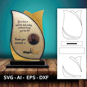 May include: A gold and black award with a photo and text that reads "You've been so supportive hard working, and honest during your time here. Thank you RINSHAD A." The award is on a black base.