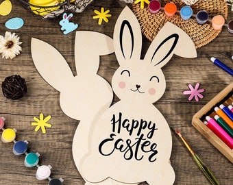 May include: Wooden bunny craft kit with the words "Happy Easter" on the front. The kit includes paint and brushes for decorating the bunny.