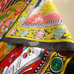 cotton fabric with detail of backside with sequin treads shows.